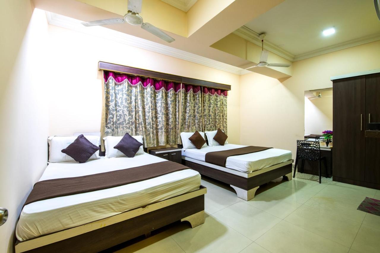 Lusia Inn Bangalore Bagian luar foto